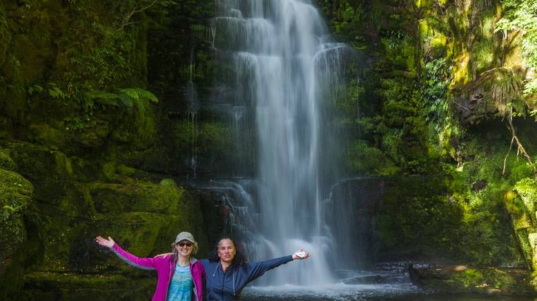 Taking a short walk to visit McLeans Falls in the Catlins | <i>Douglas McKay</i>
